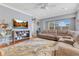 Comfortable living room with a large sectional sofa, natural light, and a cozy atmosphere at 4409 W Gray St # 5, Tampa, FL 33609
