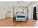 Main bedroom features a ceiling fan, wood floors, and natural light at 4409 W Gray St # 5, Tampa, FL 33609