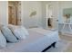 Relaxing main bedroom showcasing a cozy bed and stylish decor creating a restful environment at 3339 Elkcam Blvd, Port Charlotte, FL 33952