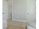Bright bedroom with ample lighting and easy access between rooms at 3339 Elkcam Blvd, Port Charlotte, FL 33952