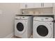A functional laundry room equipped with a modern washer and dryer for efficient laundry care at 3339 Elkcam Blvd, Port Charlotte, FL 33952