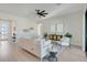Well-lit living room with modern furniture, decor, and easy access to other rooms at 3339 Elkcam Blvd, Port Charlotte, FL 33952