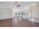 Inviting living area with hardwood floors, natural light, and convenient access to the kitchen and entry at 5009 72Nd E Ct, Bradenton, FL 34203