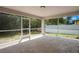 Spacious screened patio with views of the backyard at 5009 72Nd E Ct, Bradenton, FL 34203