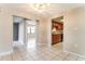 This is an open-concept kitchen featuring light gray walls, tile flooring, and dark wood cabinetry at 7221 King Arthur Dr, Port Richey, FL 34668