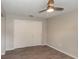 Bedroom features new floors, neutral paint, and large closet at 2597 Countryside Blvd # 204, Clearwater, FL 33761