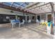 Community clubhouse with tables, chairs, and ceiling fans offering a social space for residents and their guests at 2597 Countryside Blvd # 204, Clearwater, FL 33761