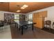 Comfortable community game room with a ping pong table, perfect for recreation and gatherings with other residents at 2597 Countryside Blvd # 204, Clearwater, FL 33761