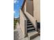 Outdoor concrete staircase provides access to the upper level at 2597 Countryside Blvd # 204, Clearwater, FL 33761