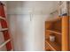 Interior storage unit with wire shelving and wood shelving at 2597 Countryside Blvd # 204, Clearwater, FL 33761