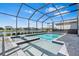 Relaxing pool with picturesque lake views is ideal for outdoor fun at 3061 Hollow Hickory Pl, Wesley Chapel, FL 33543