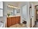 Bathroom with double vanities, soaking tub, and separate toilet room at 12802 Cattail Shore Ln, Riverview, FL 33579