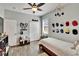 Bedroom featuring ceiling fan, wood floors and closet at 12802 Cattail Shore Ln, Riverview, FL 33579