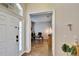 Bright entryway with tile flooring, leading into the home office at 12802 Cattail Shore Ln, Riverview, FL 33579
