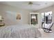 Bedroom featuring bright natural light and patio access at 268 Cory St, Port Charlotte, FL 33953