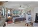 Comfortable bedroom featuring a ceiling fan, an eclectic design and a large mural at 268 Cory St, Port Charlotte, FL 33953