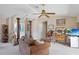 Spacious living room with comfortable seating and unique decor, perfect for relaxing and entertaining guests at 268 Cory St, Port Charlotte, FL 33953