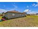 Expansive backyard with lush green grass, perfect for outdoor activities and relaxation at 10357 Scarlet Skimmer Dr, Riverview, FL 33578