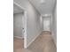 Hallway featuring tile flooring and white doors at 10357 Scarlet Skimmer Dr, Riverview, FL 33578