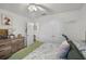 Spacious bedroom with double closet doors and a small desk at 1220 Tahitian Sunrise Dr, Plant City, FL 33565