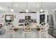 Kitchen with stainless steel appliances, granite countertop, and pendant lighting at 1220 Tahitian Sunrise Dr, Plant City, FL 33565