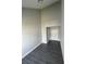 Empty bedroom with wood-look flooring and vaulted ceiling at 12219 Armenia Gables Cir, Tampa, FL 33612