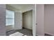 Bedroom with neutral carpeting and a closet space for storage at 1570 Hubbell Rd, Wesley Chapel, FL 33543