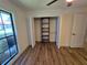 Bedroom closet featuring built-in shelves and dual hanging rods at 2055 Lakeview Dr, Clearwater, FL 33763