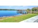 Scenic view of a dock and lake, creating a picturesque setting for relaxation and outdoor enjoyment at 2055 Lakeview Dr, Clearwater, FL 33763