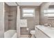 Stylish bathroom with modern fixtures, including a bathtub, toilet, and vanity at 4043 Topsail Trl, New Port Richey, FL 34652