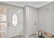Bright entryway featuring a decorative front door and neutral paint at 4043 Topsail Trl, New Port Richey, FL 34652