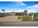 Charming single-story home with a brick driveway, a well-maintained lawn, and a cozy, inviting curb appeal at 4043 Topsail Trl, New Port Richey, FL 34652