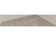 Close up of clean carpet and base molding at 507 Daylily Blvd, Nokomis, FL 34275
