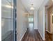 Inviting entryway with wood floors, leading to an open and airy living space at 507 Daylily Blvd, Nokomis, FL 34275