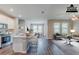Open-concept living area with modern finishes and plenty of natural light at 507 Daylily Blvd, Nokomis, FL 34275