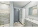 Nicely updated bathroom features new vanity, cabinet, and tiled shower at 5817 26Th W St, Bradenton, FL 34207