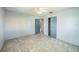Bedroom featuring new tile floors, ceiling fan, closet, and new paint at 5817 26Th W St, Bradenton, FL 34207