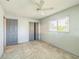 Bedroom featuring new floors, ceiling fan, large closet, and a big window at 5817 26Th W St, Bradenton, FL 34207