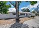 Charming single-story home with a well-maintained lawn, a metal roof and a new fence at 5817 26Th W St, Bradenton, FL 34207