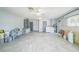Expansive utility room showcasing tile flooring and a variety of storage options at 5817 26Th W St, Bradenton, FL 34207