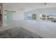 Bright living room featuring expansive water views from large windows and sliding doors at 5186 Fleming St, Port Charlotte, FL 33981