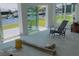 Bright sunroom with sliding glass doors and waterfront views at 5186 Fleming St, Port Charlotte, FL 33981