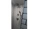 Modern bathroom with tiled shower and updated fixtures at 5186 Fleming St, Port Charlotte, FL 33981