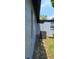 Exterior shot of new AC unit, newly painted walls, and manicured yard at 2202 Whitney Pl, Valrico, FL 33594