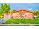 A single-story residence with a fenced yard and matching detached structure at 2202 Whitney Pl, Valrico, FL 33594
