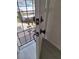 The front door features a black handle and lockset and a security screen door at 3716 Mistwood Dr, Tampa, FL 33619