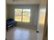 Cozy bedroom with a bright window at 5052 Trekell St, North Port, FL 34287