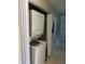 Convenient laundry area with stacked washer and dryer, maximizing space efficiency at 5052 Trekell St, North Port, FL 34287