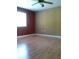 Bedroom with laminate floors and natural light at 2011 N 61St St, Tampa, FL 33619