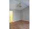 Cozy bedroom featuring hardwood floors and neutral-colored walls at 2011 N 61St St, Tampa, FL 33619